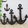 Load image into Gallery viewer, Add Nautical Charm with the Wood Mediterranean Ship Rudder and Anchor Wall Decor
