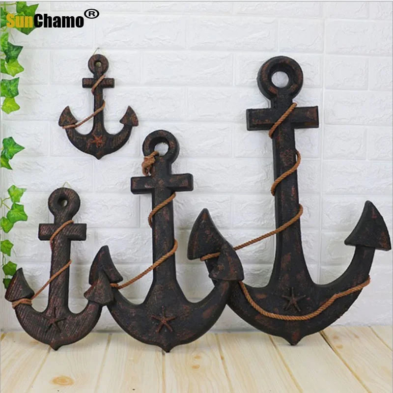 Add Nautical Charm with the Wood Mediterranean Ship Rudder and Anchor Wall Decor