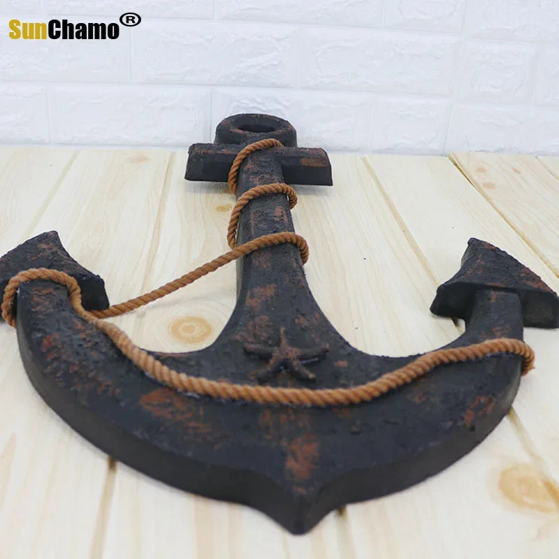 Add Nautical Charm with the Wood Mediterranean Ship Rudder and Anchor Wall Decor